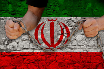 male hands breaking the iron chain, symbol of bondage, protest against the background of the state...