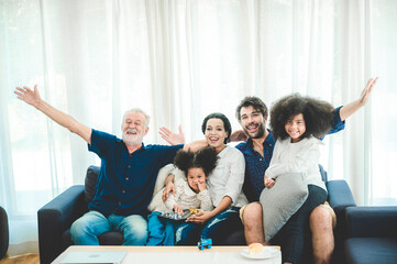 Portrait of happy smiling senior father at home, senior man in family concept