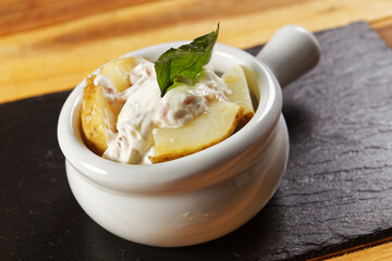 Pumpkin mousse with roasted vegetables, steamed red rice, and baked potatoes with cream and ham.