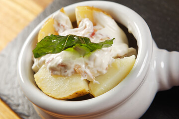 Pumpkin mousse with roasted vegetables, steamed red rice, and baked potatoes with cream and ham.