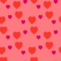 Seamless pattern with positive red and pink hearts on warm pink background. Vector image.