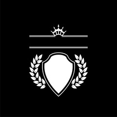 Abstract Royal shield badge isolated on dark background