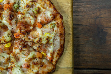 pizza on wood table close up image  for food content.