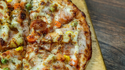 pizza on wood table close up image  for food content.