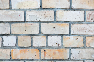 red brick wall with cement