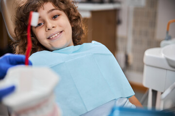 Teeth-brushing demonstration for young patients of the clinic