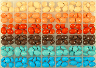 candy sweet dragee lies on a bright background