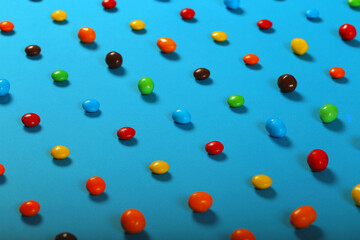 candy sweet dragee lies on a bright background