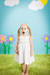 Surprised Little Girl Standing in Imaginary Outside Wonderland World