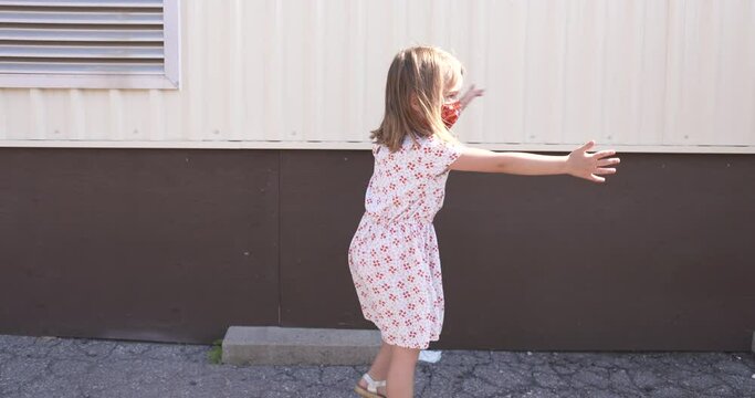 A Little Girl In A Mask Just Wants A Hug At School, But No One Is Allowed.