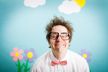 Happy Nerdy Man Smiling in Imaginary Outside Wonderland World