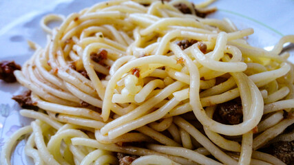Spaghetti Bolognese with minced beef in the white plate