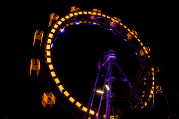 Night view of the Wiener riesenrad fair ferris wheel in Vienna, Austria.