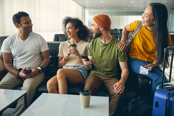 Smiling young people going to travel together