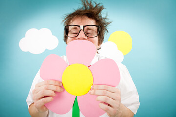 Nerdy Man Smelling a Flower in Imaginary Outside Wonderland World