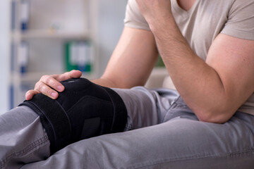 Young leg injured man in the hospital