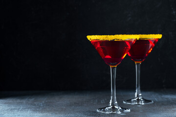 Halloween red coctail  in glass on dark background