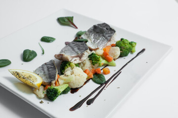 Fototapeta na wymiar steam cooked mackerel fish with vegetables isolated