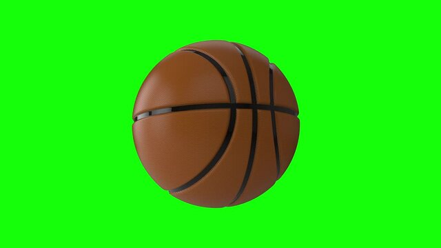 Beautiful hero shot of a spinning basketball on green key background