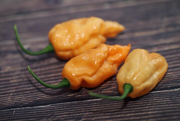 Chili peppers on rustic table