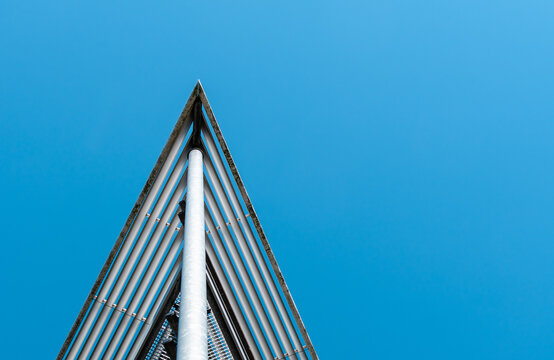 Low Angle View Of Skyscraper Against Clear Blue Sky