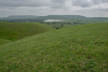 LANDSCAPE GREEN HILL SLOPE WITH CLOUD 
