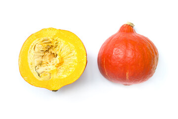 Pumpkin cut in half over white background