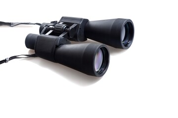 Black binoculars isolated over white background