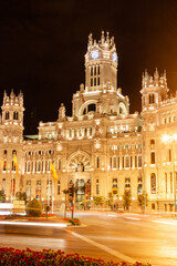 Fototapeta na wymiar Late evening on the main street of Madrid in night illumination. Madrid, Spain