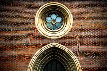Gothic rosette window above entrance portal of Riga Doms cathedral. Latvia.