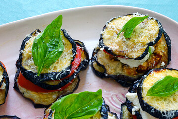 Roasted eggplant, tomato, cheese and basil stacks