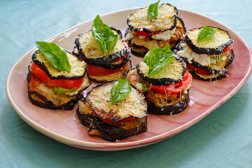 Roasted eggplant, tomato, cheese and basil stacks