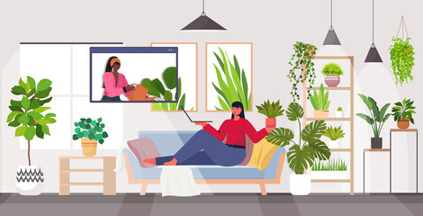 woman taking care of houseplants housewife discussing with friend in web browser window during video call full length horizontal vector illustration