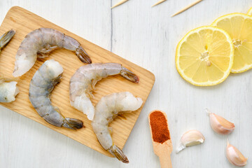 Top view of fresh raw prawn with spice and herbs