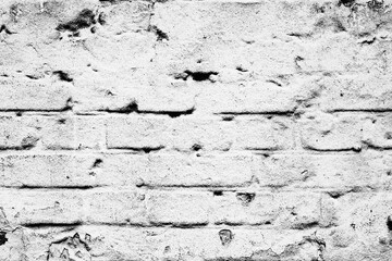 Texture of a brick wall with cracks and scratches which can be used as a background