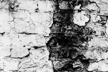Obraz premium Texture of a brick wall with cracks and scratches which can be used as a background