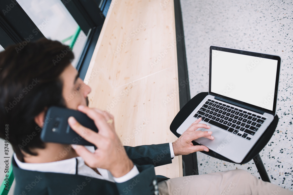 Aufkleber skilled male financial expert calling to mobile service for discussing laptop system connecting to 4