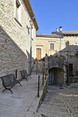 Fototapeta premium A narrow street among the old houses of Sepino, a medieval village in the Molise region.
