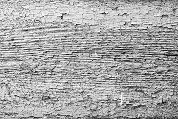 Wooden texture with scratches and cracks. It can be used as a background