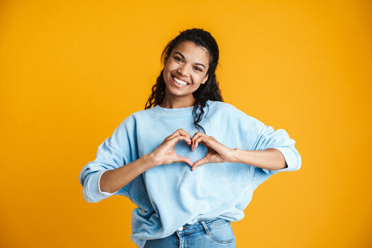 Beautiful African Making Heart Symbol With Hands