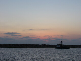 Fishing boat at sunset