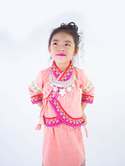little girls wearing pink native dress on white background