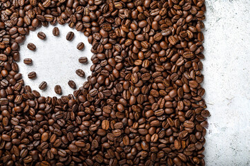 Roasted coffee beans in the shape of Clock. Coffee time concept.