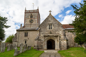 Fototapeta na wymiar The exterior of the church St Peter and St Paul in Hambledon Hampshire, A typical English church