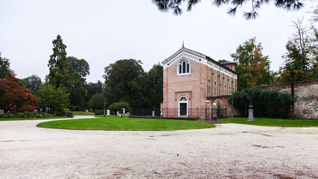 PADUA, ITALY - NOVEMBER 1, 2012: Parco dell Arena with Scrovegni Chapel (capella degli scrovegni) in Padua city in autumn. This church contains fresco by Giotto, completed about 1305.