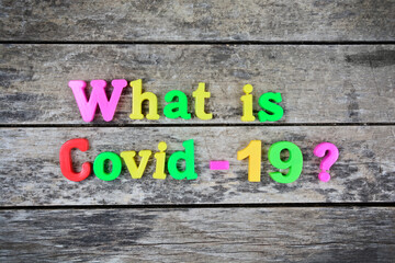 Question What is covid-19 on a wooden table
