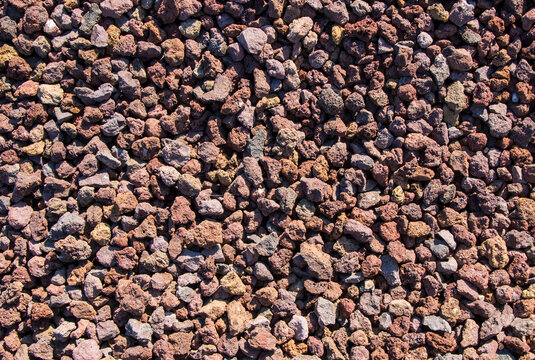 sfondo ghiaia marrone con sassolini ideale come pattner per terreno esterno