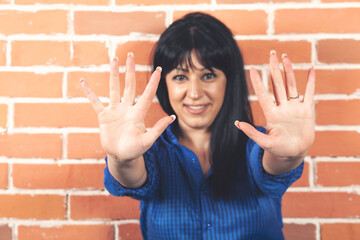 Young woman doing rejection pose
