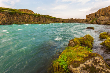 The milky blue waters of the Skjalfandafljot River, Iceland.