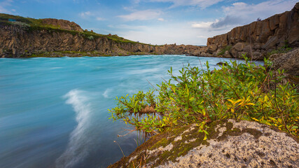 The milky blue waters of the Skjalfandafljot River, Iceland.